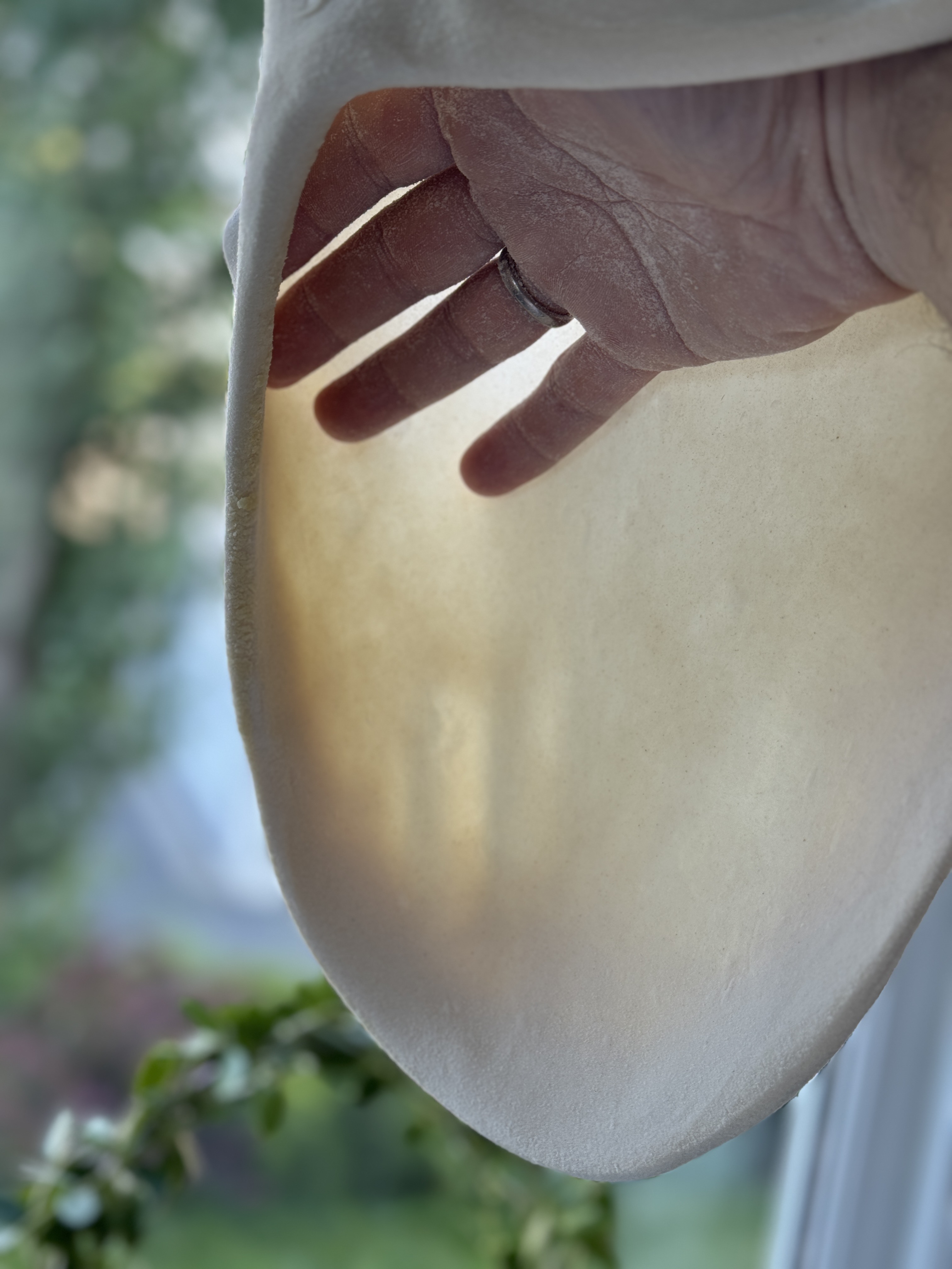 Utstrekking av pizzabunn